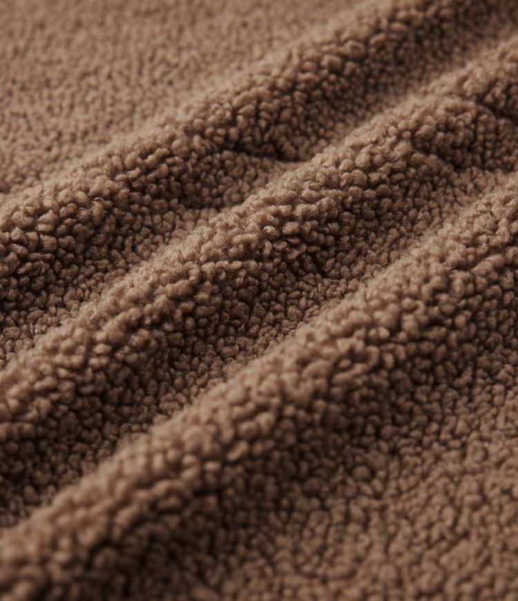 Manteau sherpa col tailleur coupe décontractée avec poches