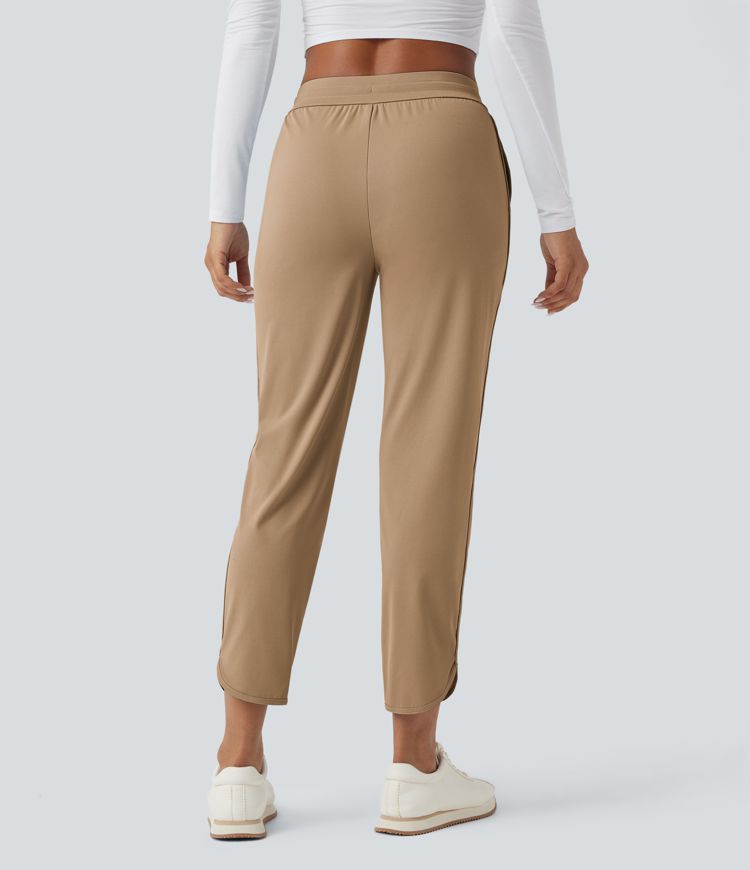 Golf-Hose mit mittelhohem Bund, Seitentaschen und schmal zulaufendem Bein - schnelltrocknend, UPF40+