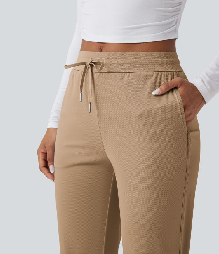 Golf-Hose mit mittelhohem Bund, Seitentaschen und schmal zulaufendem Bein - schnelltrocknend, UPF40+