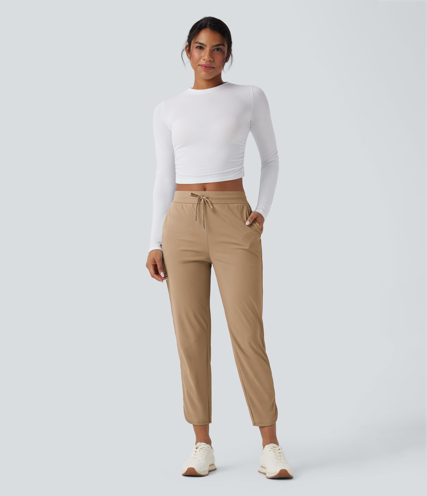 Golf-Hose mit mittelhohem Bund, Seitentaschen und schmal zulaufendem Bein - schnelltrocknend, UPF40+