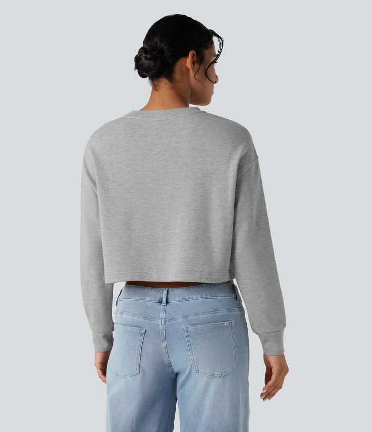Lässiges Baumwoll-Sweatshirt mit Rundhalsausschnitt, langen Ärmeln und Tasche