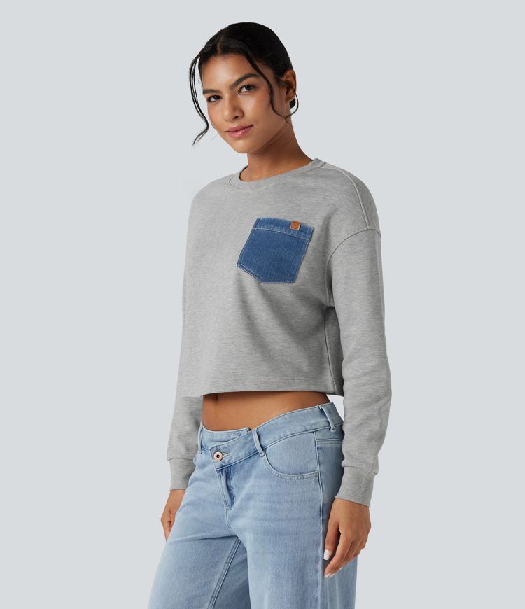 Lässiges Baumwoll-Sweatshirt mit Rundhalsausschnitt, langen Ärmeln und Tasche