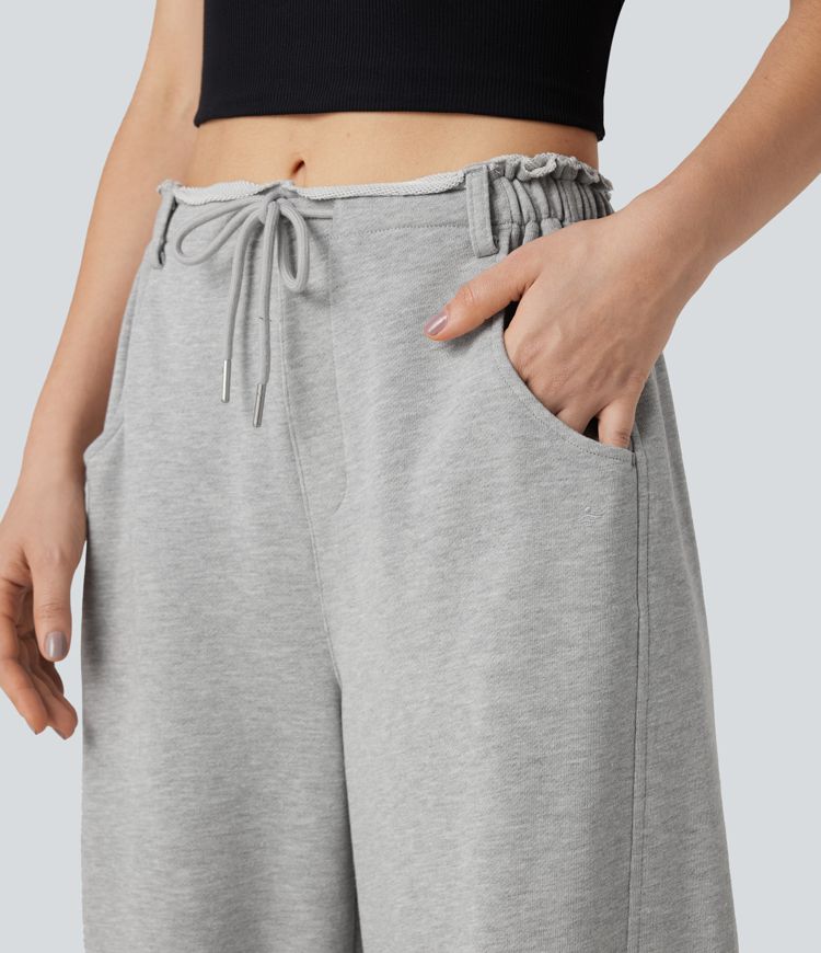 Pantalon jogging large taille mi-haute finition brute avec cordon de serrage et poches