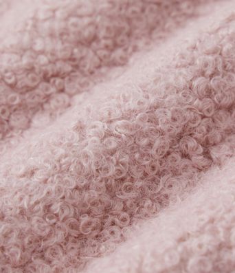 Afslappede bukser med mellemhøj talje og snøre, i teddy-stof, med vide ben og lommer.