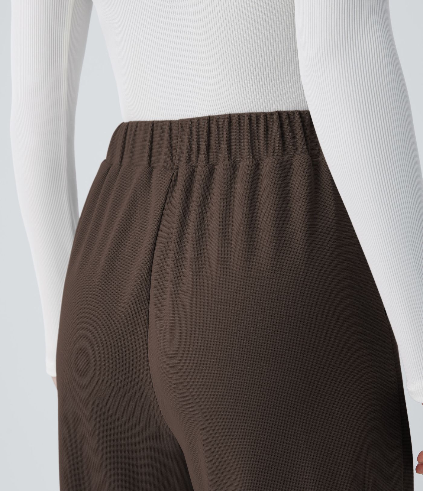 Pantalón tiro alto botón bolsillo lateral plisado pierna ancha