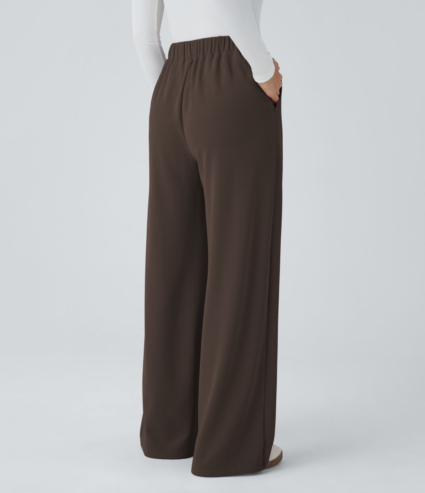 Pantalón tiro alto botón bolsillo lateral plisado pierna ancha