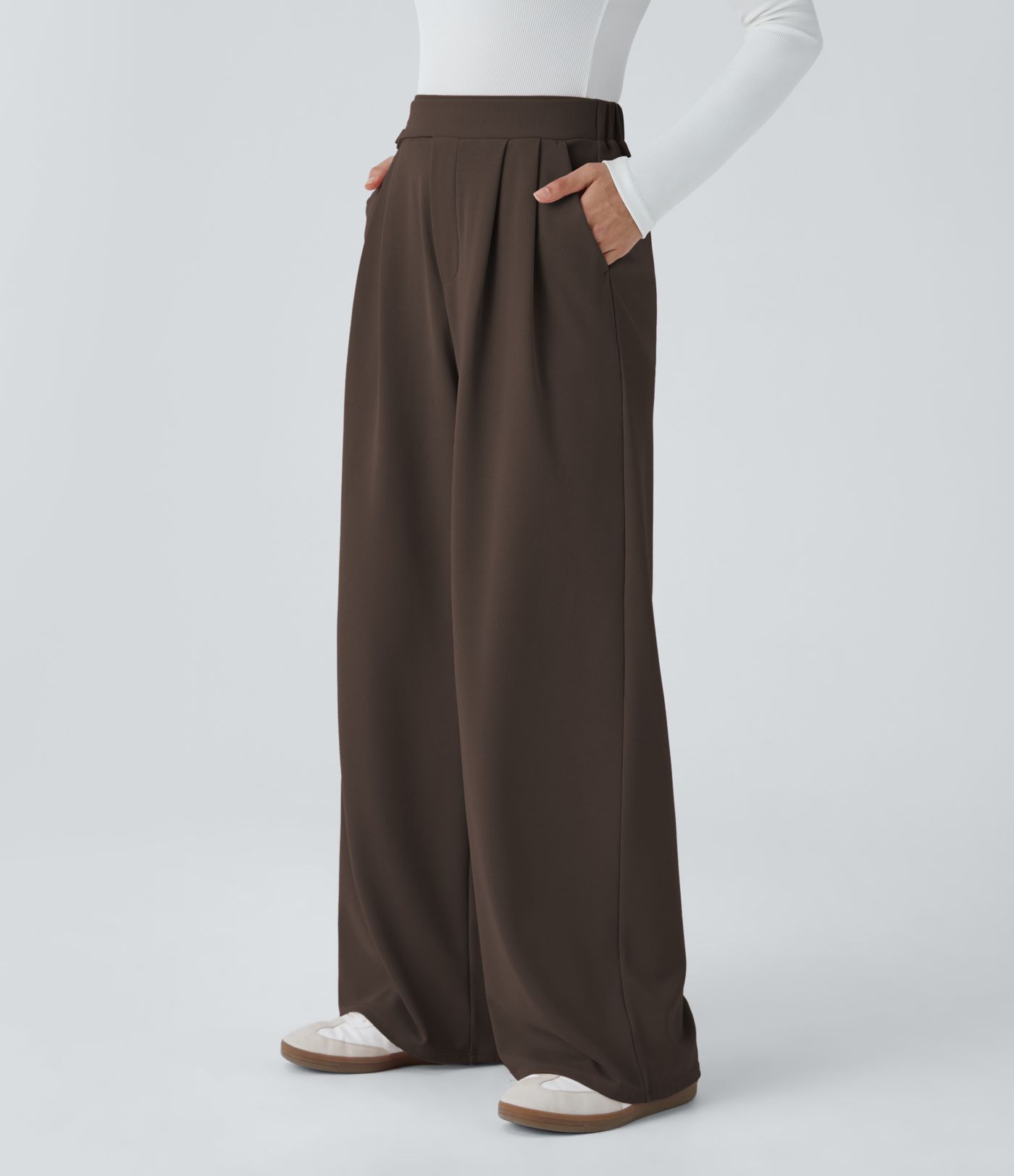 Pantalón tiro alto botón bolsillo lateral plisado pierna ancha