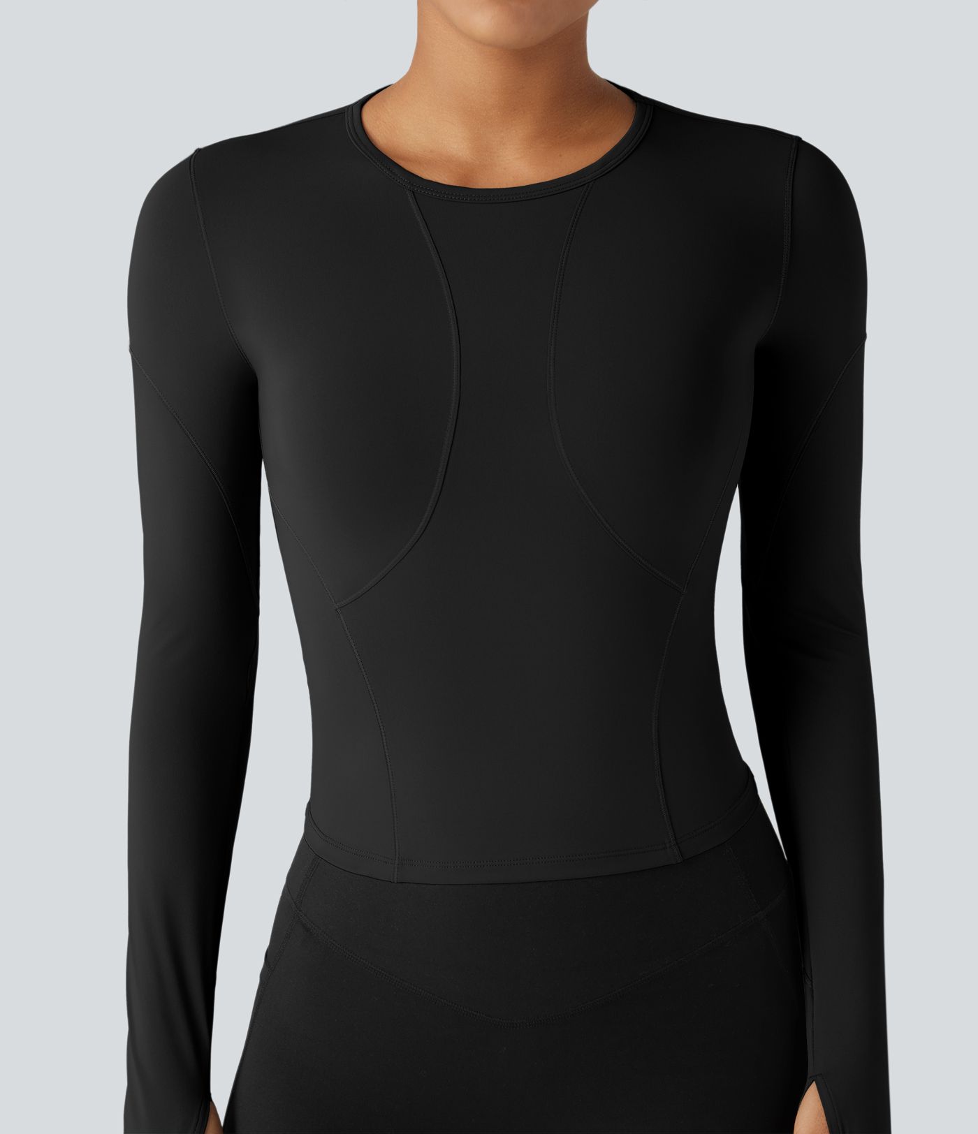 Top deportivo de yoga de manga larga con cuello redondo y abertura para el pulgar