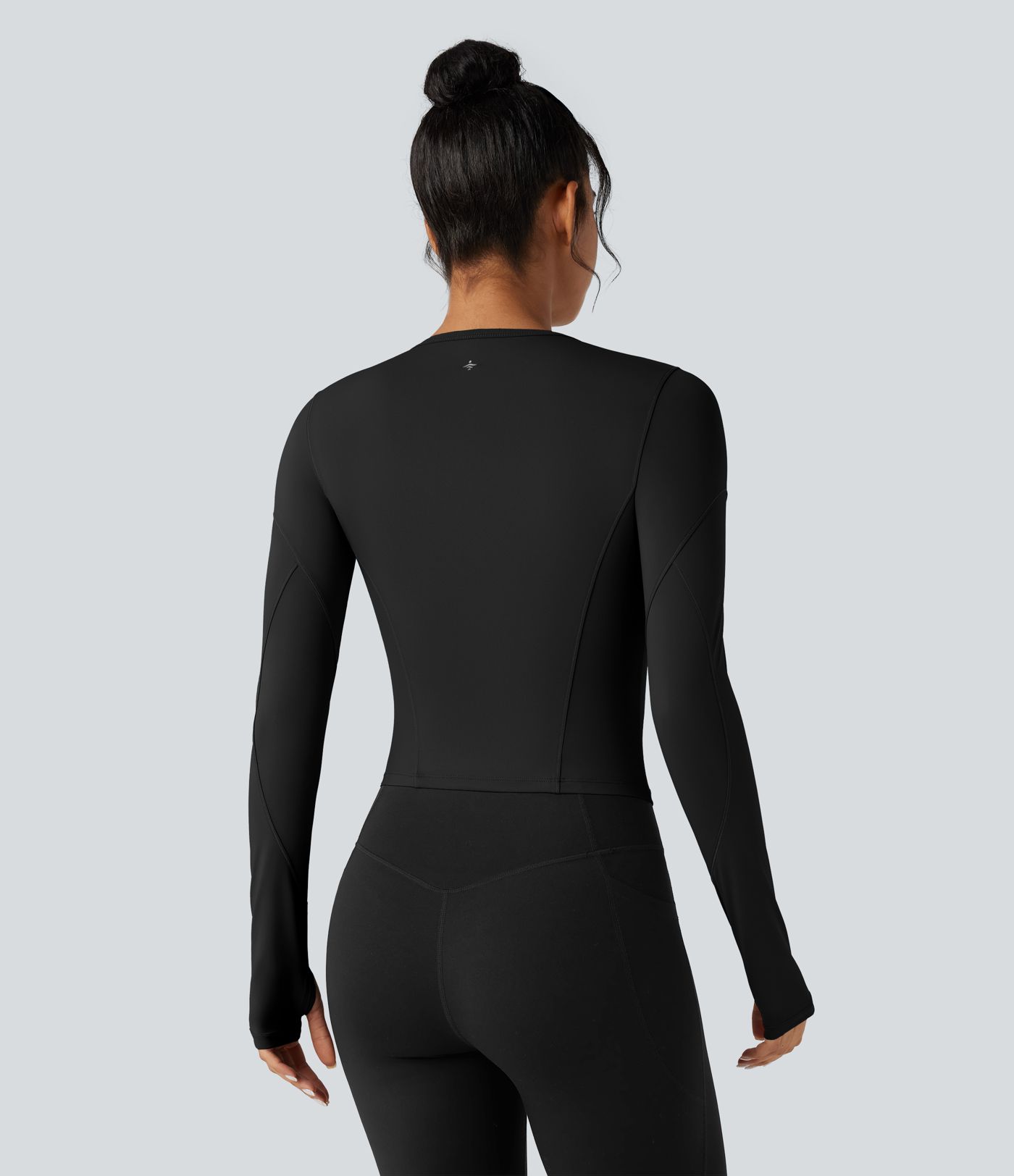 Top deportivo de yoga de manga larga con cuello redondo y abertura para el pulgar