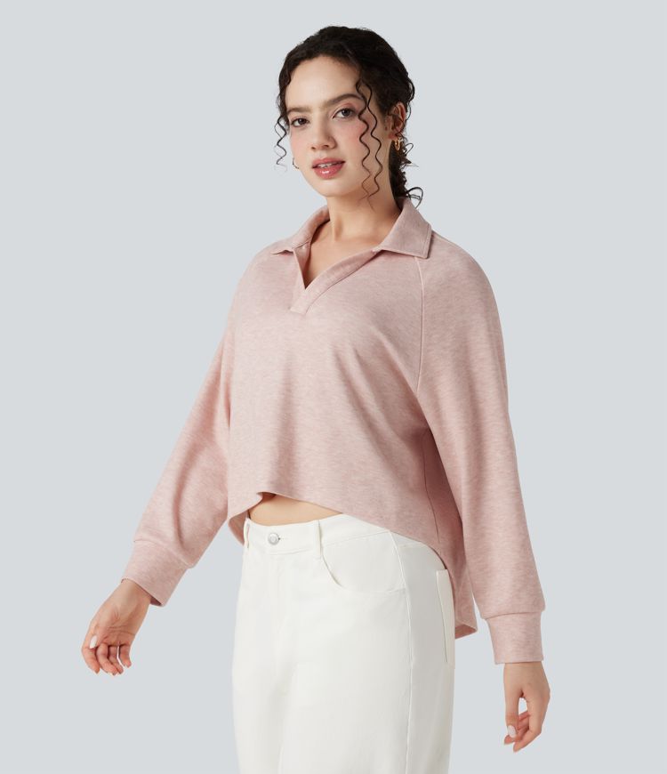 Sweat-shirt col tailleur manches raglan longues ourlet asymétrique coupe décontractée