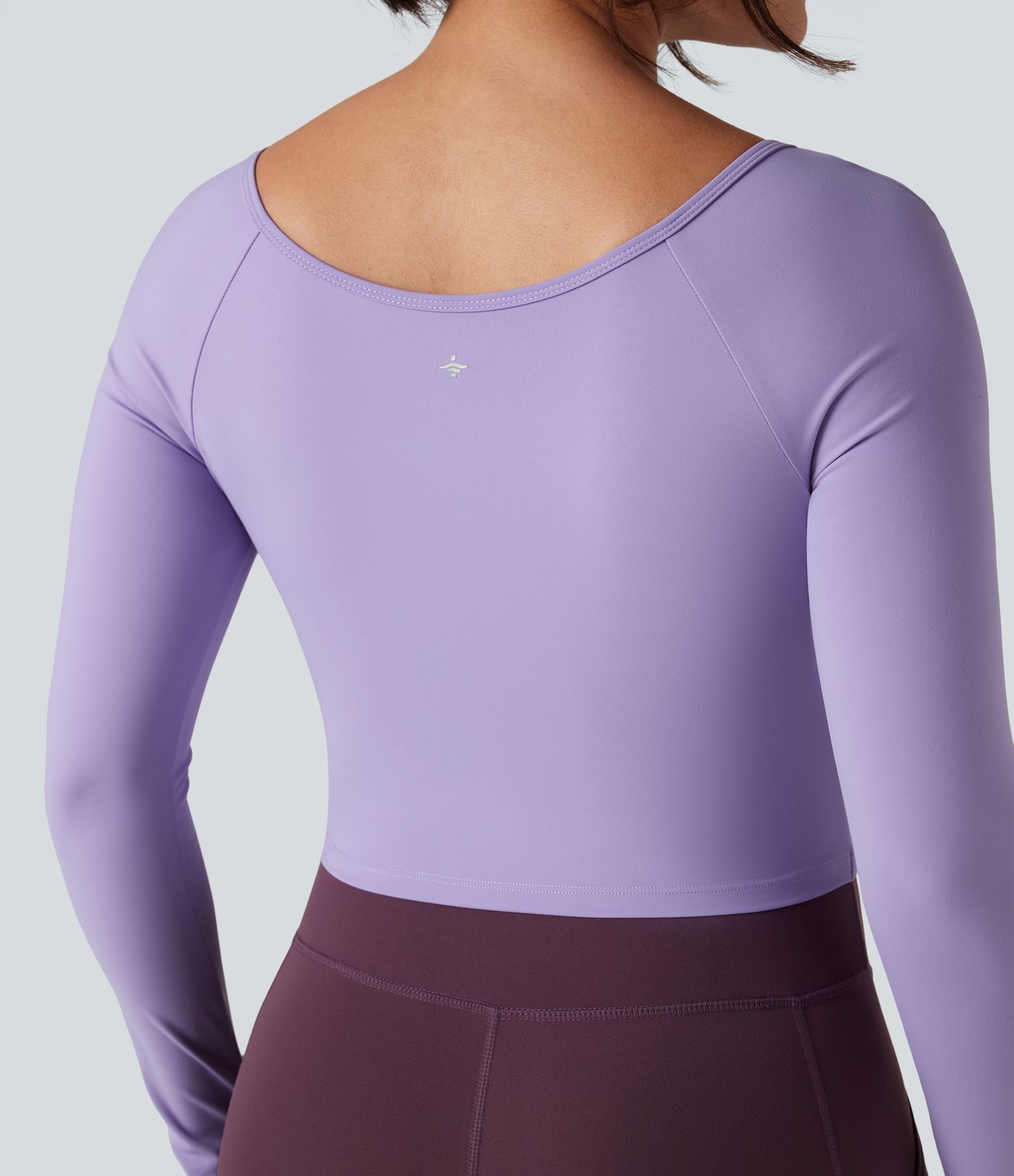 SoftlyZero™ flauelsmjúkur jóga- og íþróttatoppur með hringhálsi, löngum ermum, þumalopum og krossuðum kanti