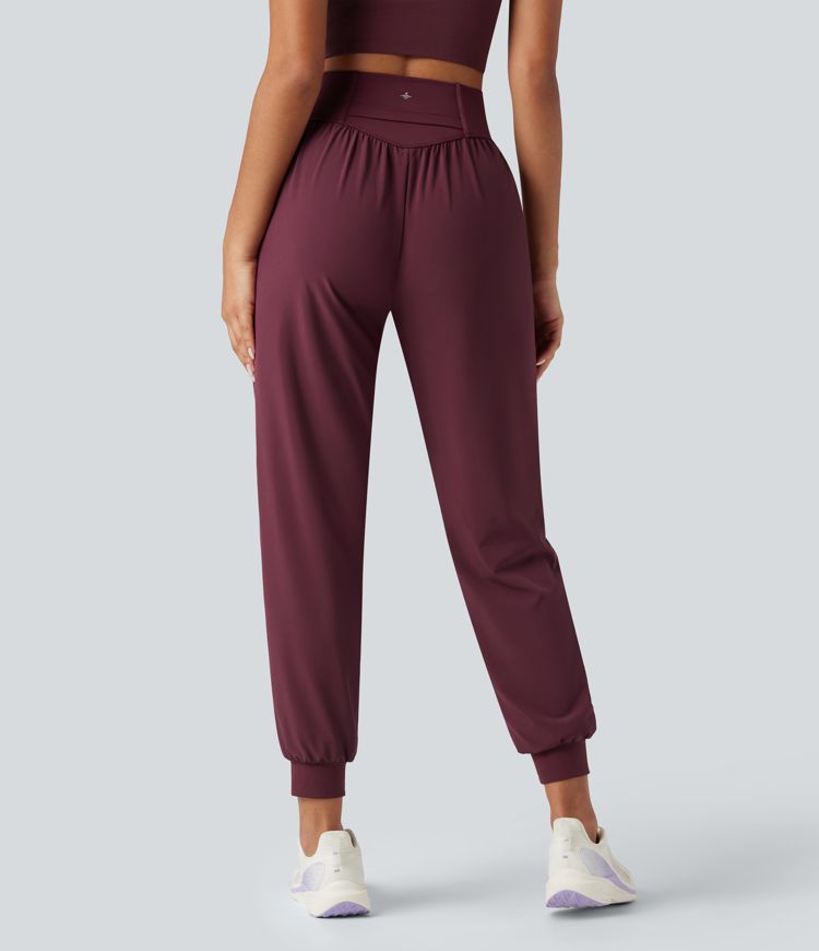 Jogging de course gainant taille haute avec cordon de serrage intérieur et séchage rapide avec poches Breezeful™