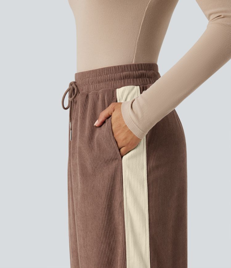 Hochgeschnittene Cordhose im Colorblock-Design mit Kordelzug, geradem Bein und Taschen