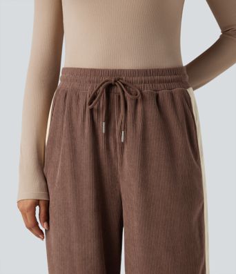 Hochgeschnittene Cordhose im Colorblock-Design mit Kordelzug, geradem Bein und Taschen