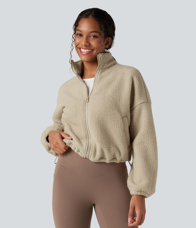 Fleece-Trainingsjacke mit hohem Kragen, Seitentaschen, langen Ärmeln und Reißverschluss