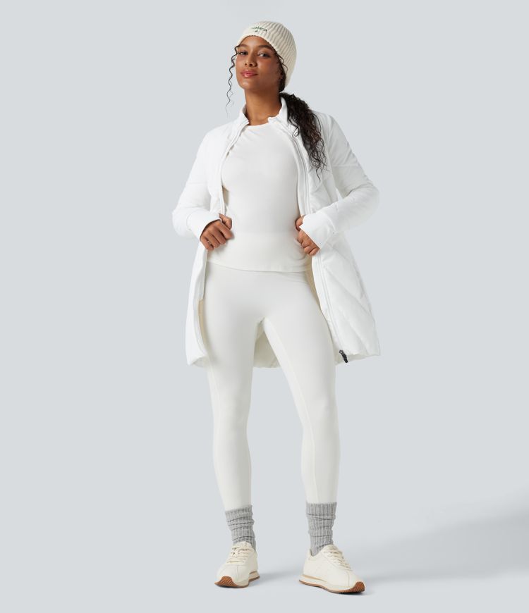 Veste matelassée col montant double fermeture éclair avec trous pouces et poches