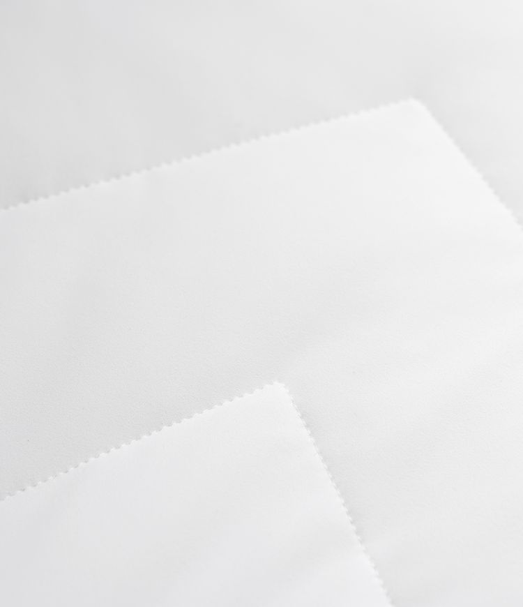 Veste matelassée col montant double fermeture éclair avec trous pouces et poches