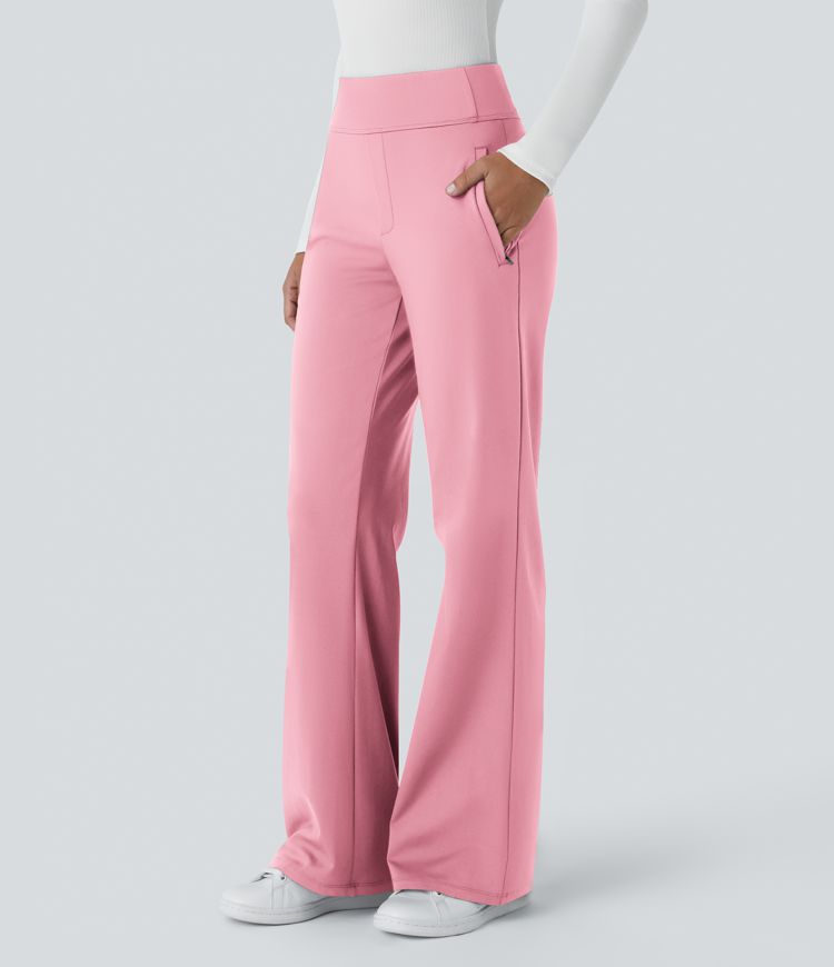 Pantalon Tailleur évasé  à taille haute et poches latérales zippées