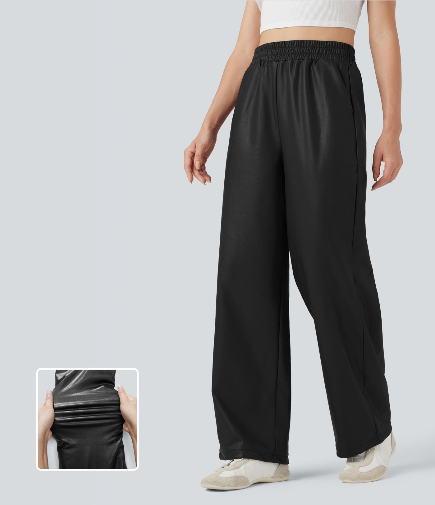 Kõrge vöökohaga, sirgete säärtega, lõdva lõikega PU-nahast püksid taskutega