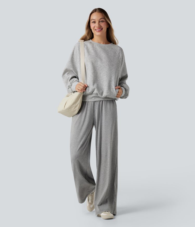 Sweat-shirt col rond manches longues à découpes avec poches