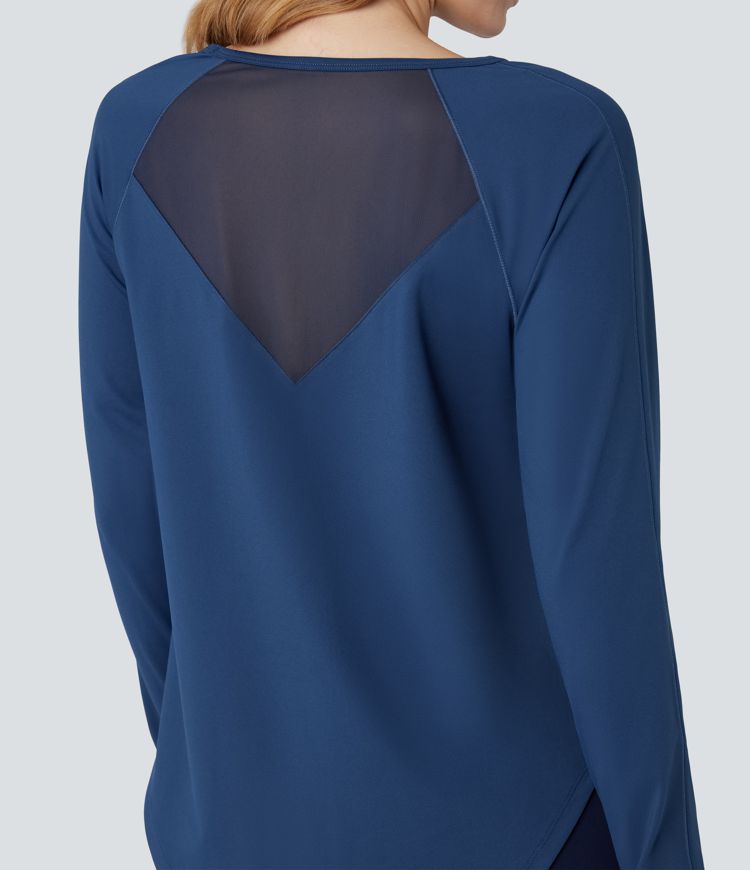 Top de sport à encolure ronde, manches longues, ouverture pour le pouce et empiècements en maille contrastée