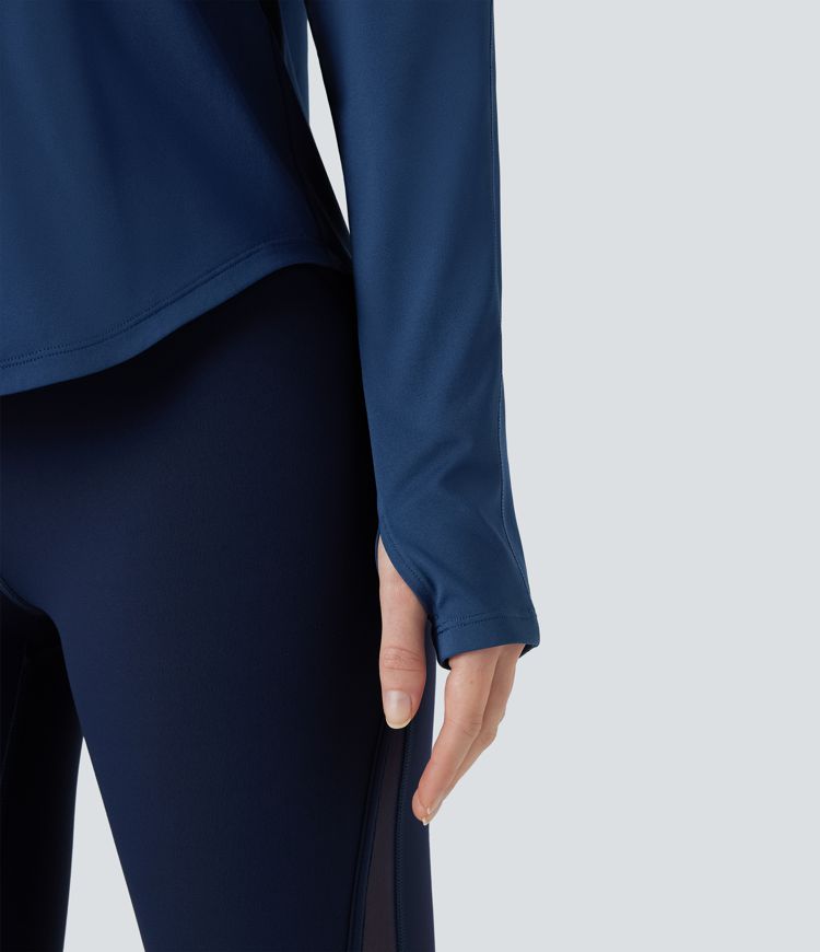 Top de sport à encolure ronde, manches longues, ouverture pour le pouce et empiècements en maille contrastée