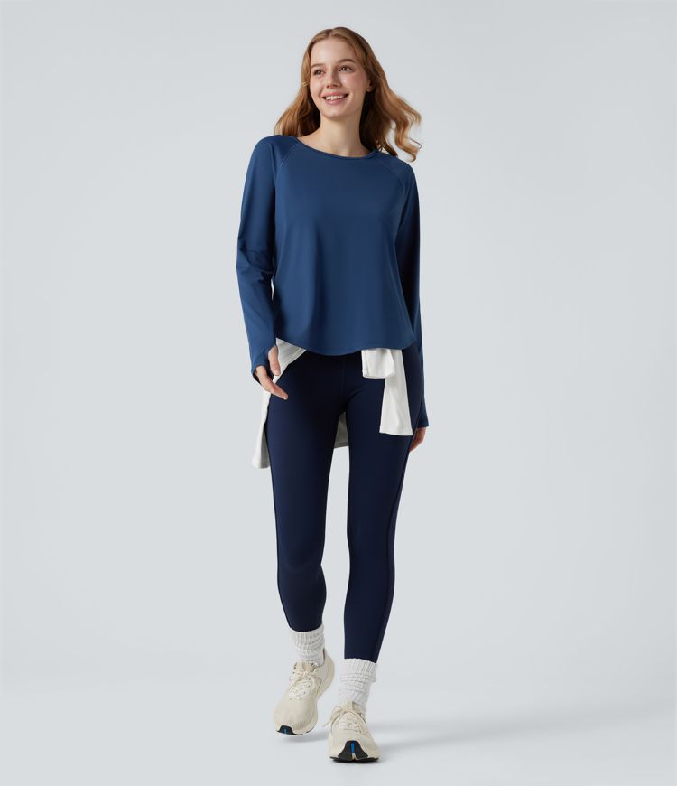 Top de sport à encolure ronde, manches longues, ouverture pour le pouce et empiècements en maille contrastée