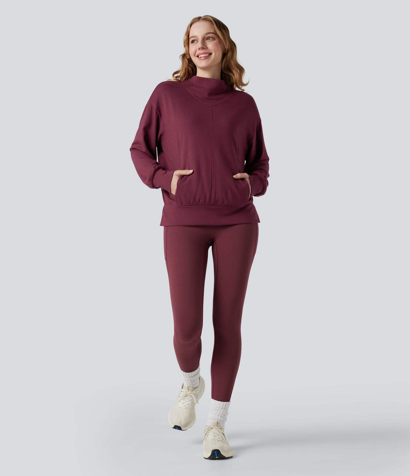 Halara HeatCore - Yoga-Sport-Top mir hohem Kragen, Taschen und langen Ärmeln - wärmend