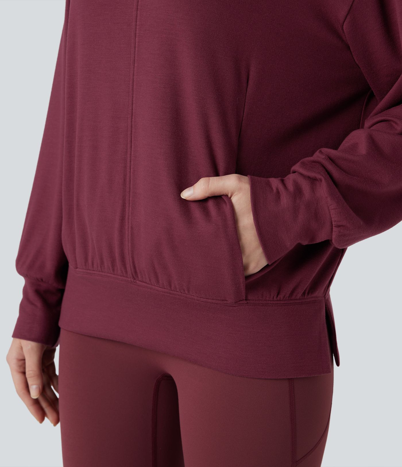 Halara HeatCore - Yoga-Sport-Top mir hohem Kragen, Taschen und langen Ärmeln - wärmend