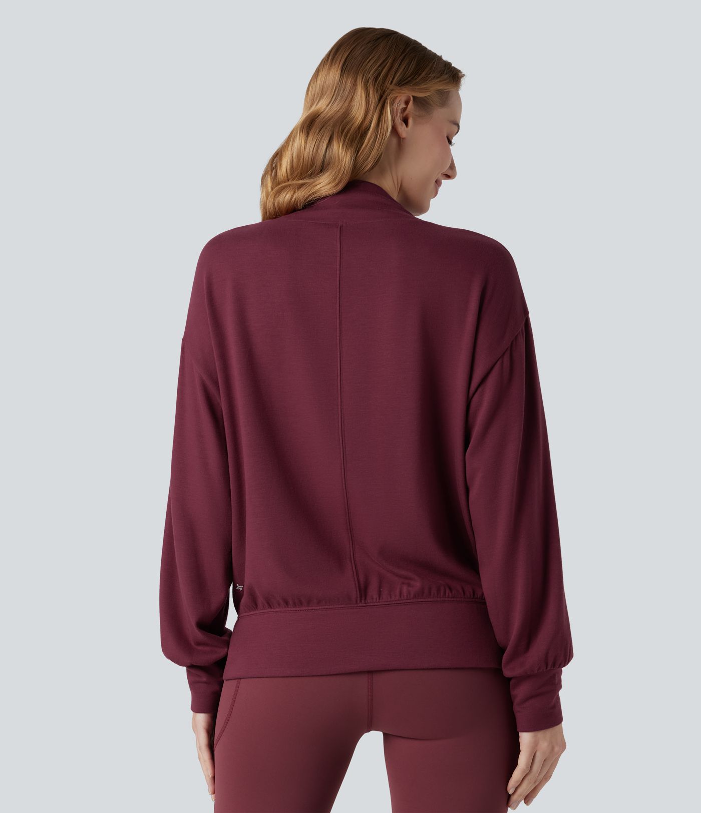 Halara HeatCore - Yoga-Sport-Top mir hohem Kragen, Taschen und langen Ärmeln - wärmend