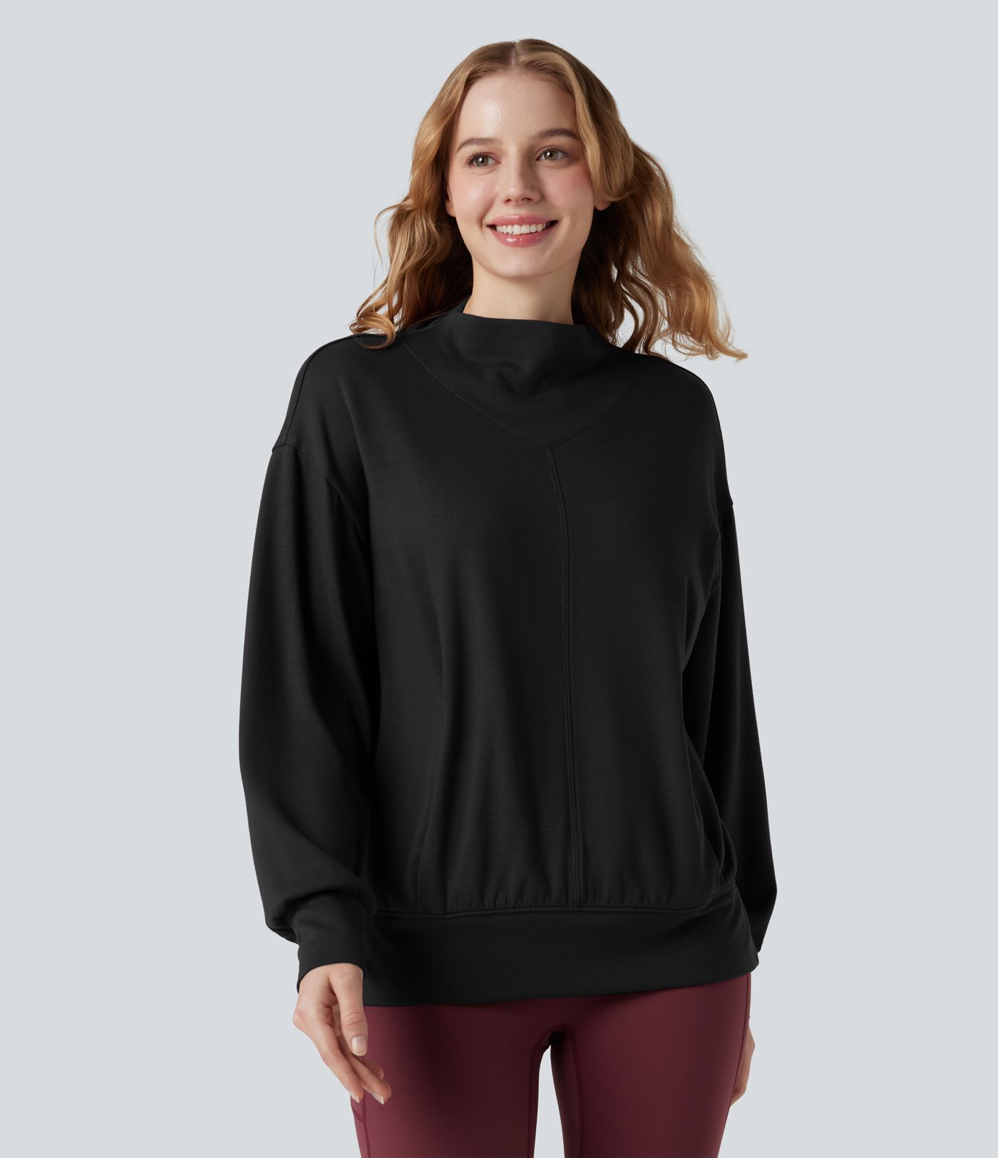 Halara HeatCore - Yoga-Sport-Top mir hohem Kragen, Taschen und langen Ärmeln - wärmend