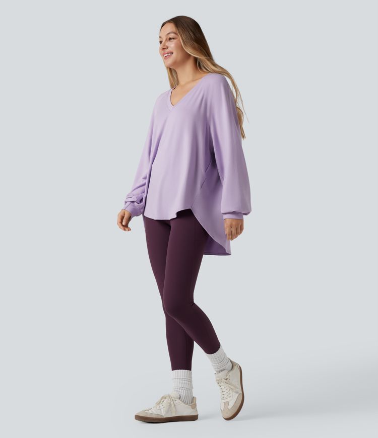Lässiges Sweatshirt mit V-Ausschnitt, langen Ärmeln und High-Low-Design