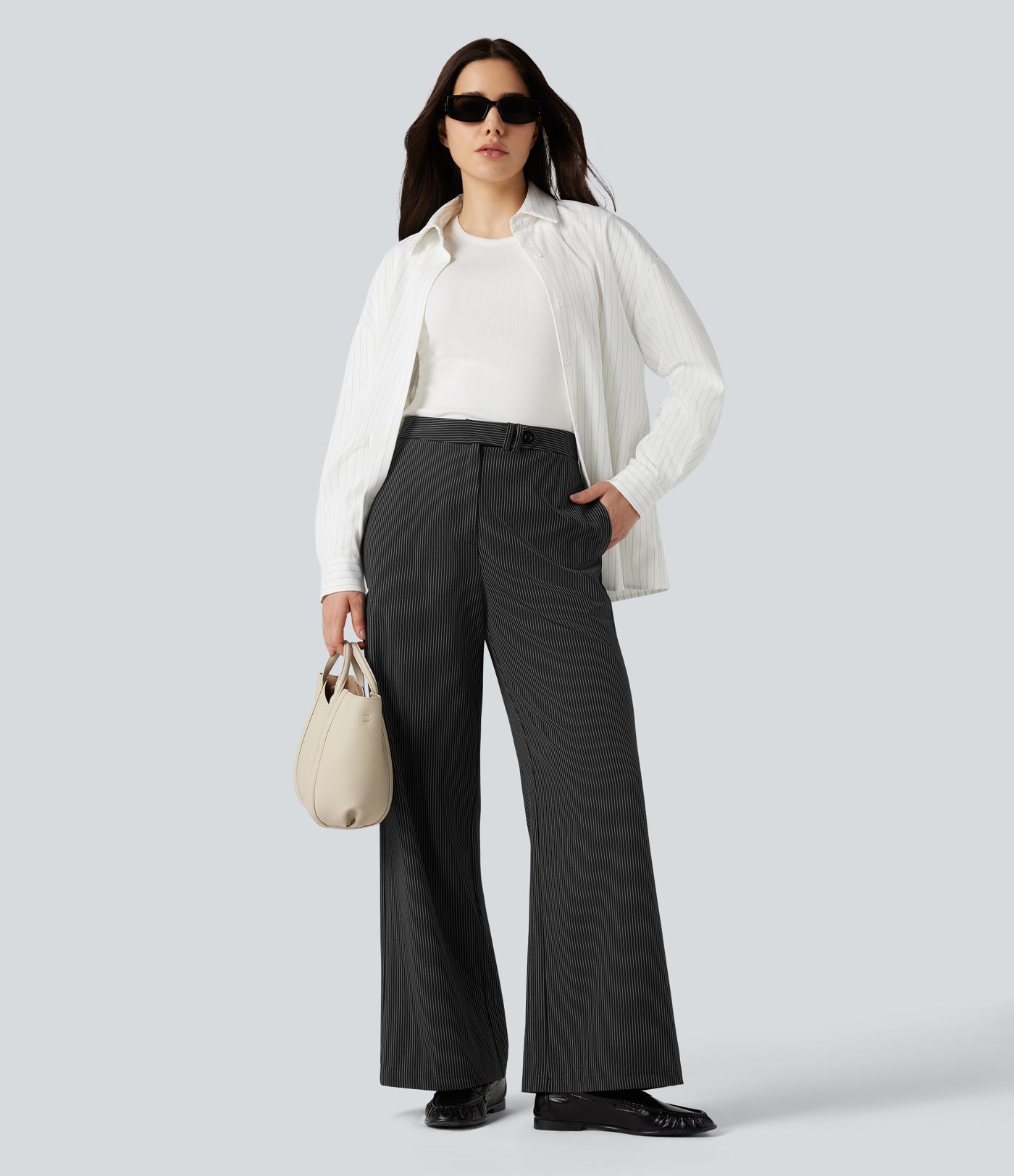 Röndóttar vinnubuxur með háum mitti, beinum fótum og vösum