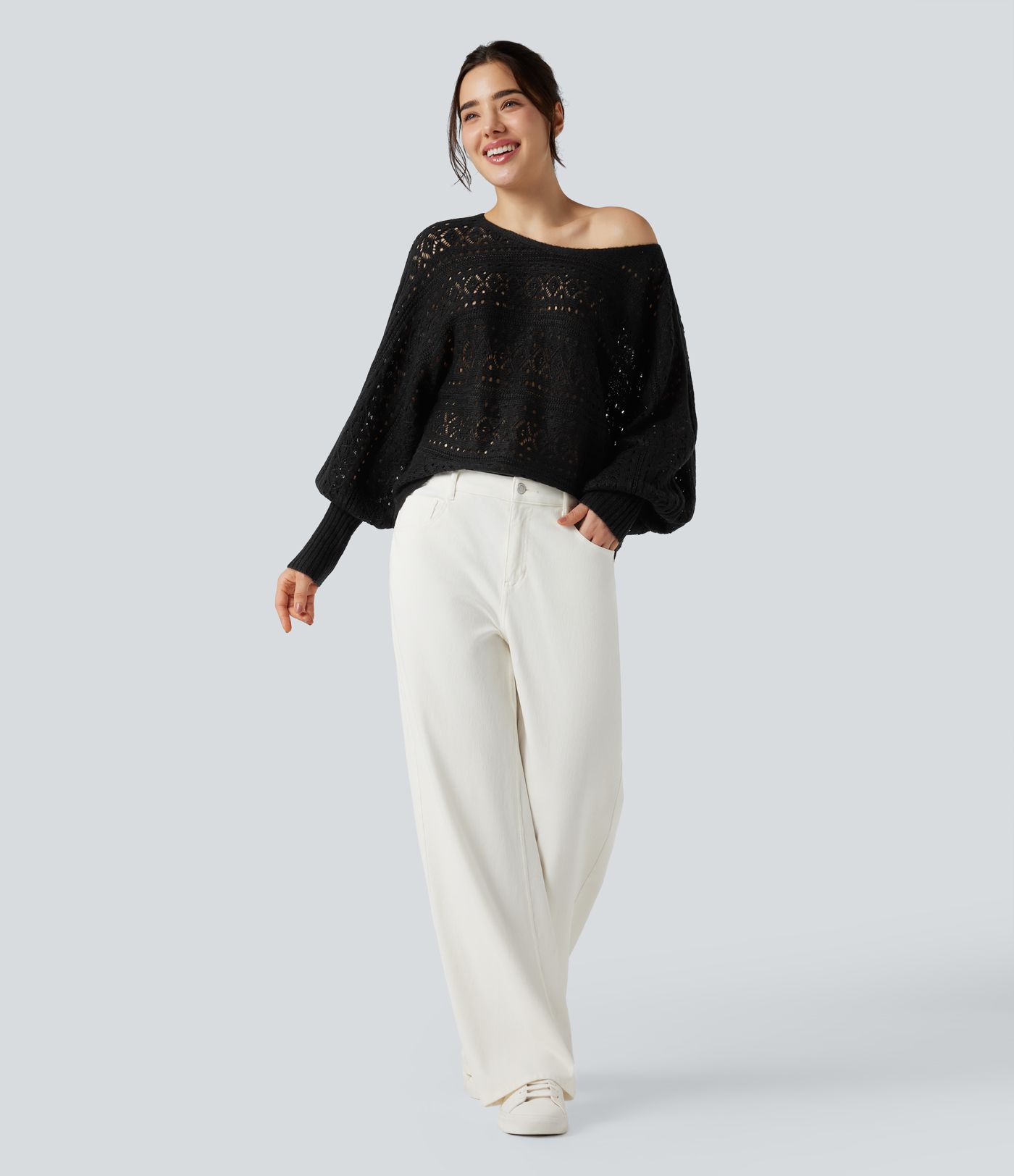 Pull ajouré col rond manches chauve-souris longues