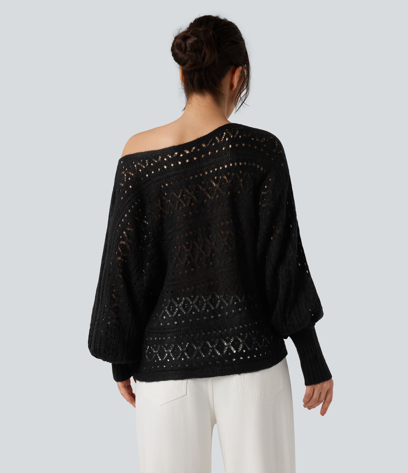 Pull ajouré col rond manches chauve-souris longues