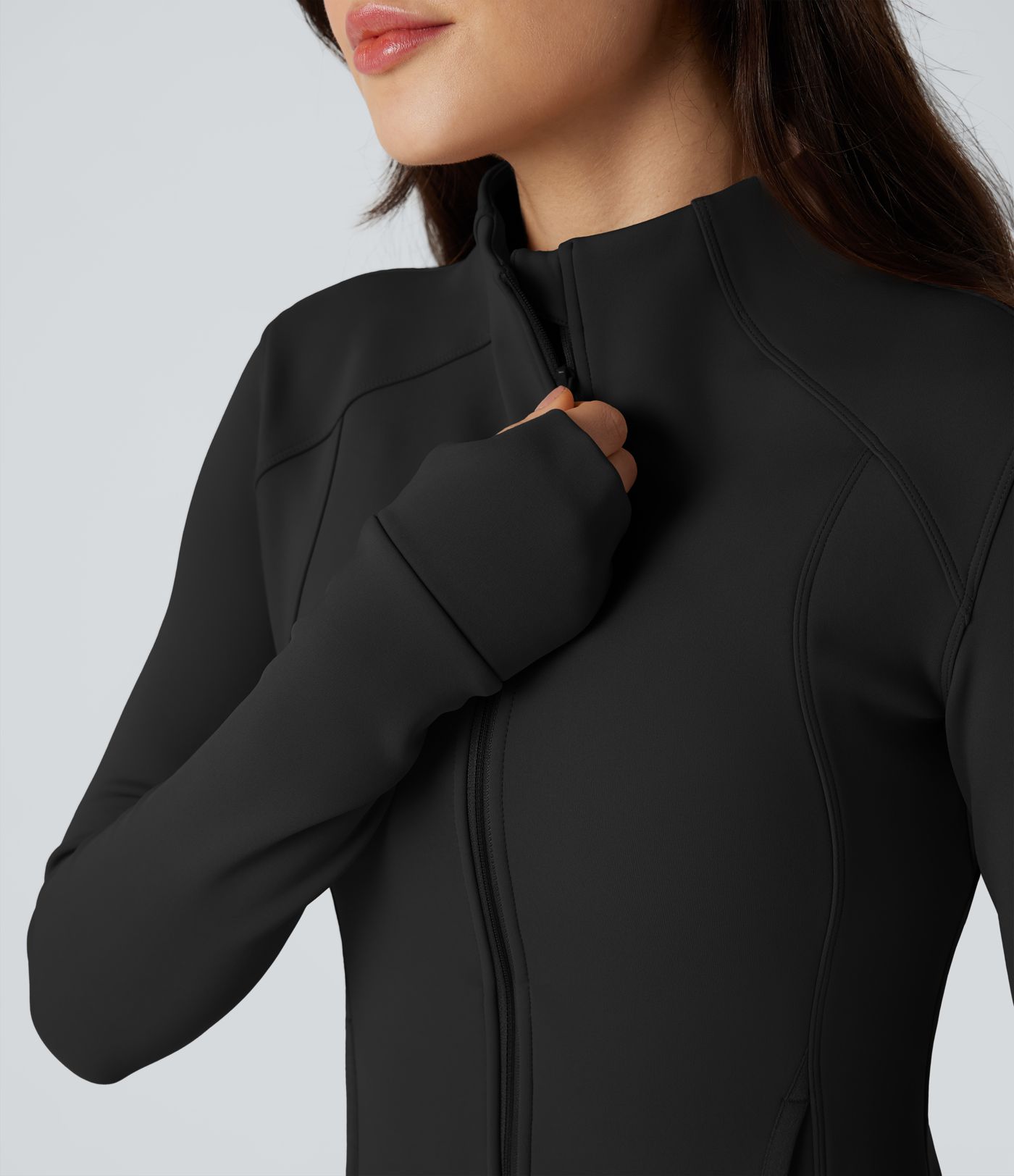 Fleece-Trainingsjacke mit langen Ärmeln, Daumenlöchern und Taschen