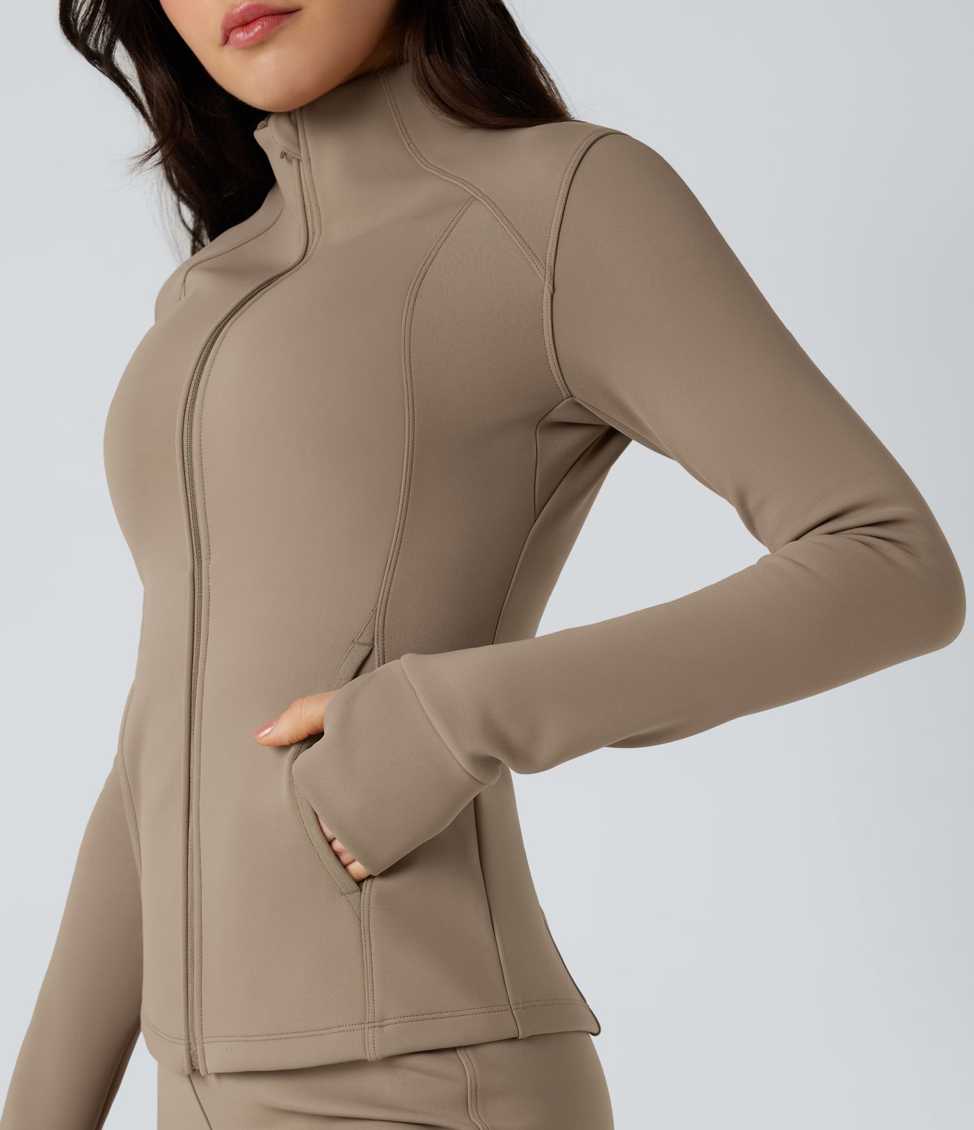 Fleece-Trainingsjacke mit Seitentaschen, langen Ärmeln und Daumenlöchern