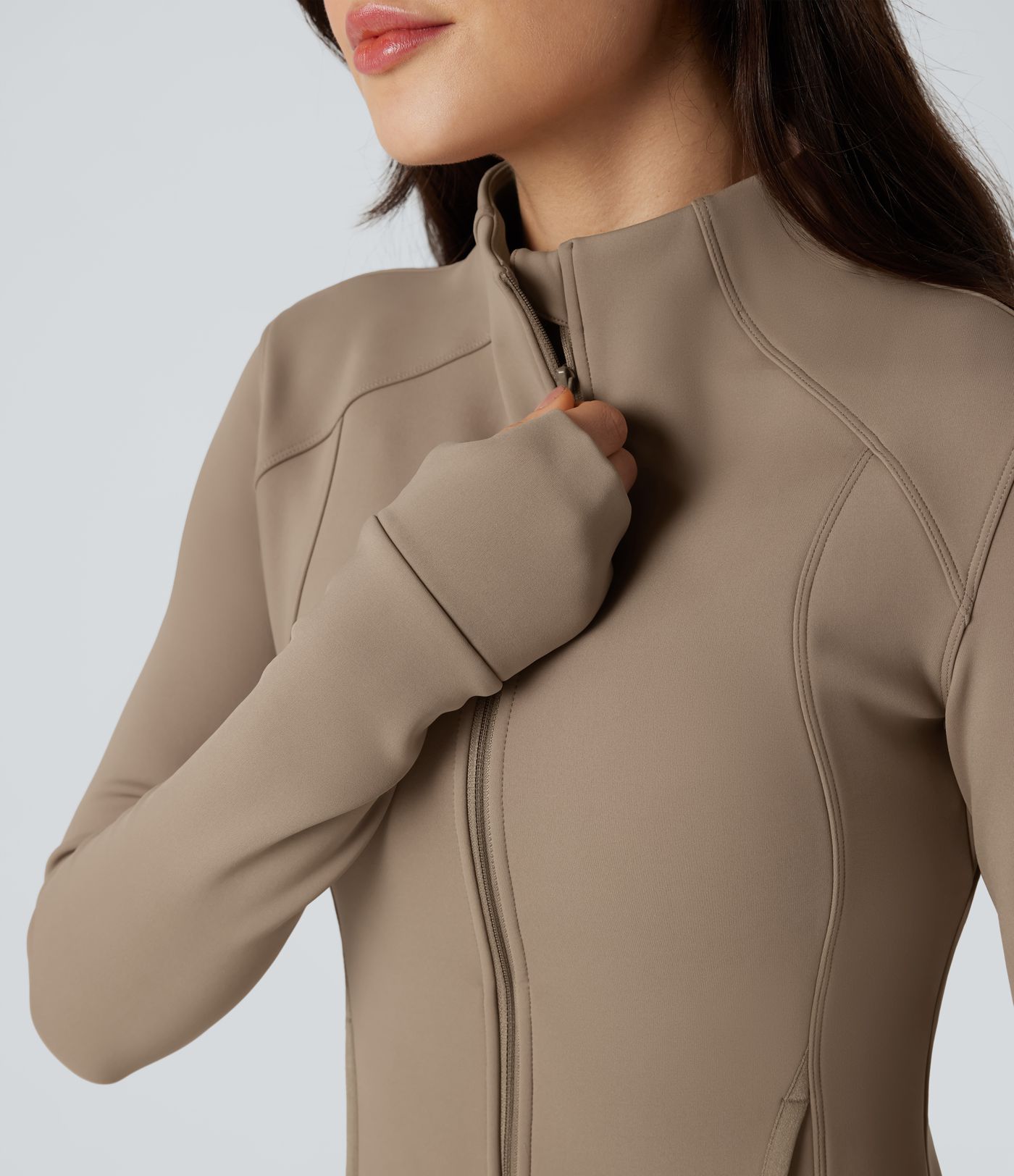 Fleece-Trainingsjacke mit Seitentaschen, langen Ärmeln und Daumenlöchern