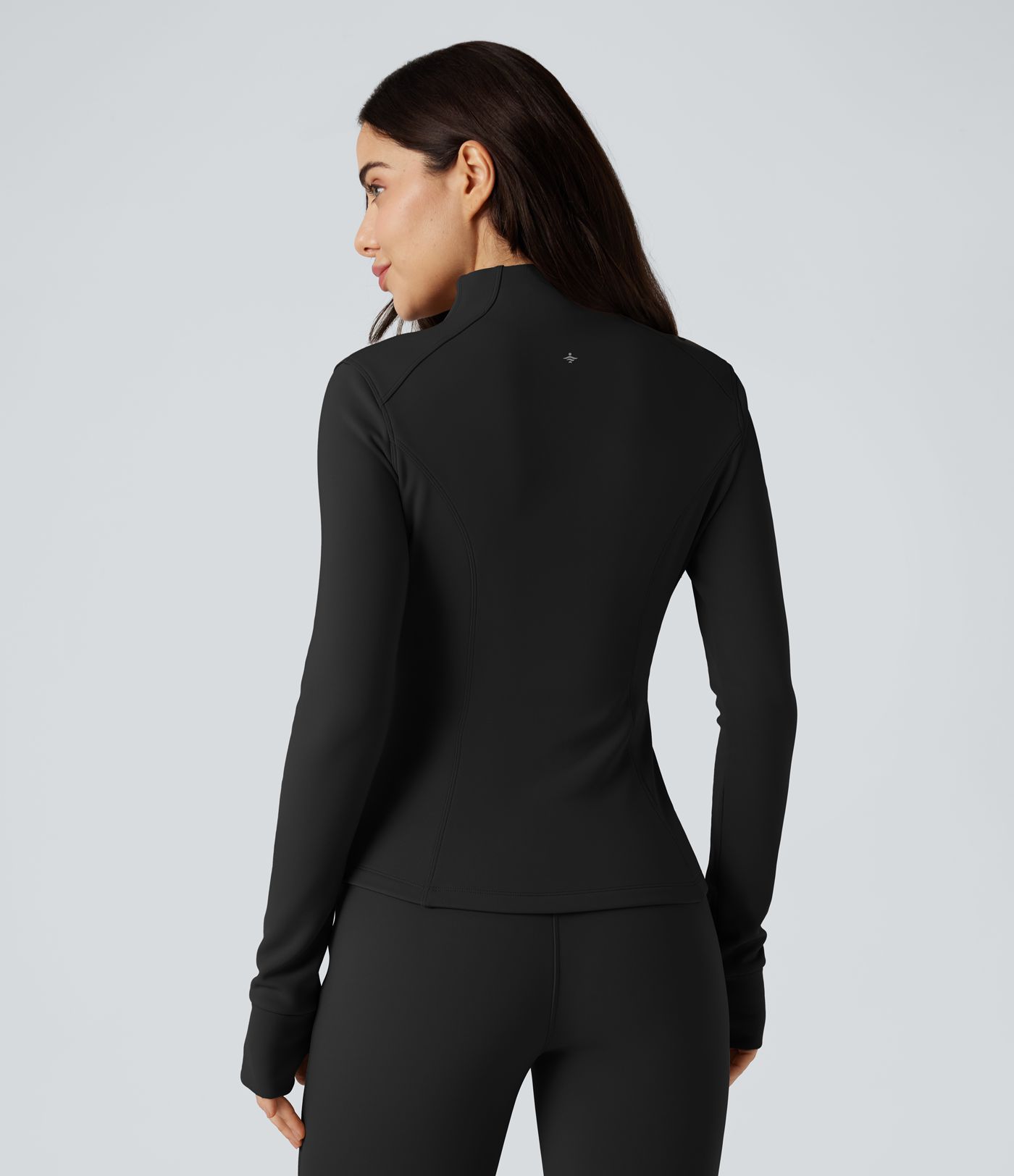 Fleece-Trainingsjacke mit langen Ärmeln, Daumenlöchern und Taschen