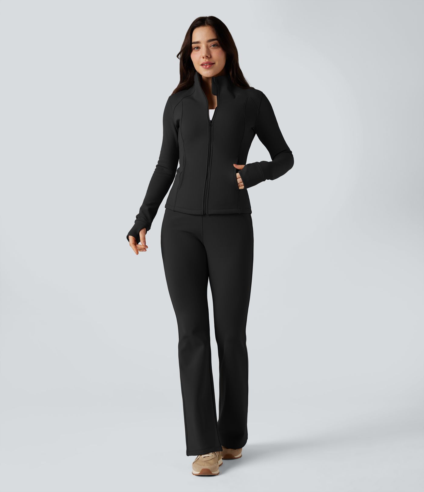 Fleece-Trainingsjacke mit langen Ärmeln, Daumenlöchern und Taschen