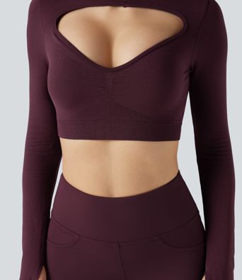 Top corto deportivo para yoga sin costuras, de manga larga, con cut-out fluido y agujero para el pulgar.