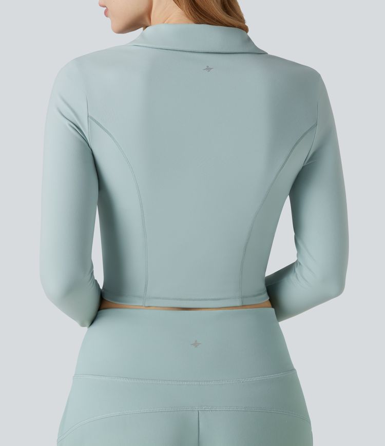 SoftlyZero™ polo in morbido tessuto plush, maniche lunghe, foro per il pollice, top corto sportivo da tennis