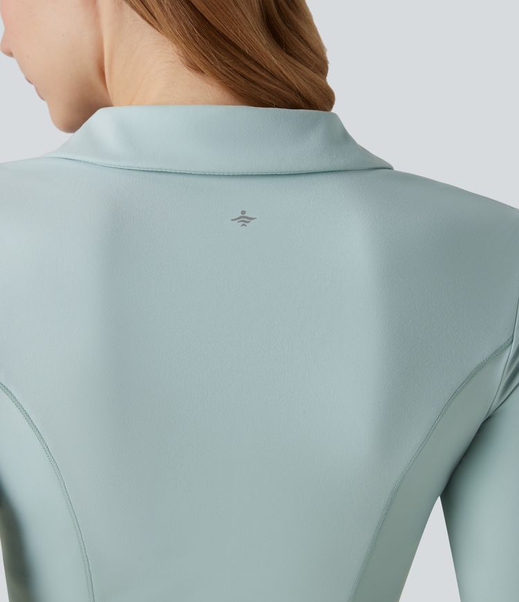 SoftlyZero™ polo in morbido tessuto plush, maniche lunghe, foro per il pollice, top corto sportivo da tennis