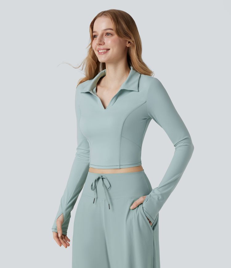 SoftlyZero™ polo in morbido tessuto plush, maniche lunghe, foro per il pollice, top corto sportivo da tennis