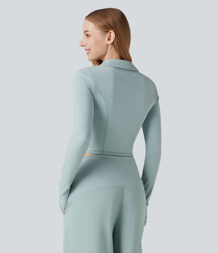 SoftlyZero™ polo in morbido tessuto plush, maniche lunghe, foro per il pollice, top corto sportivo da tennis