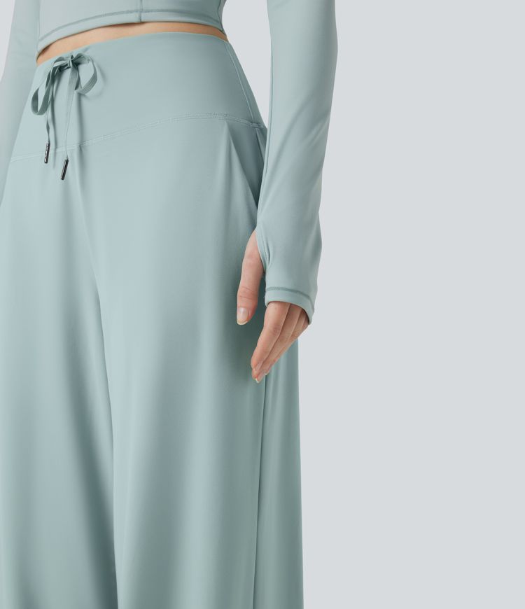 SoftlyZero™ polo in morbido tessuto plush, maniche lunghe, foro per il pollice, top corto sportivo da tennis