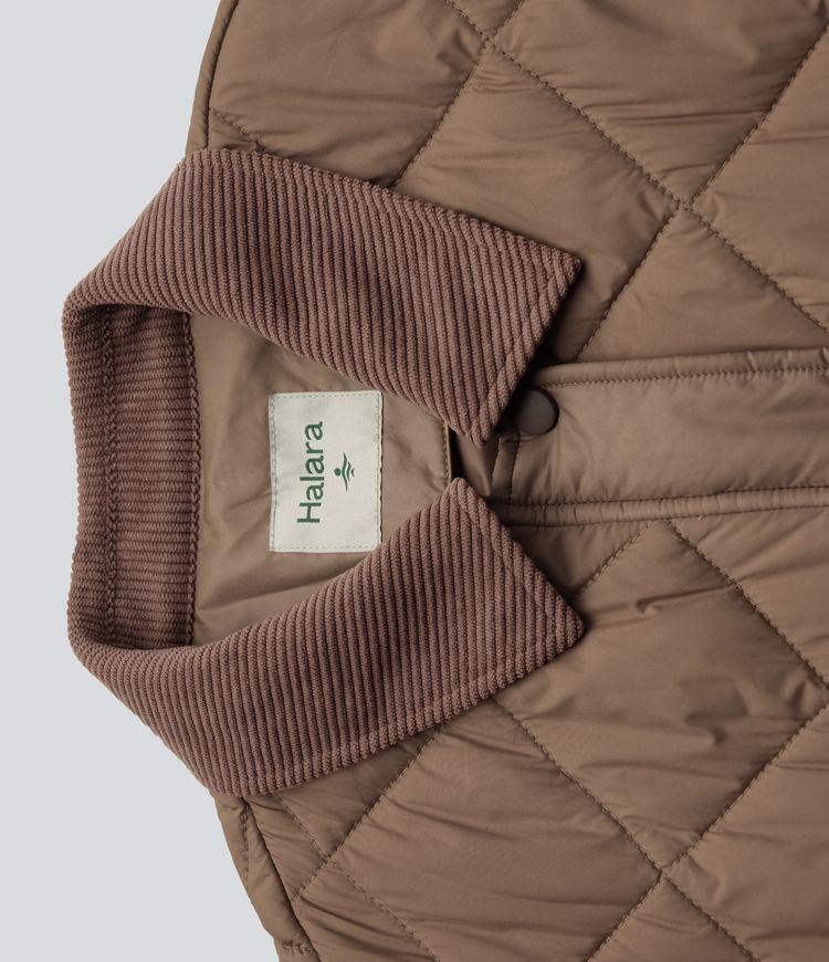 Veste matelassée velours côtelé contrastant avec cordon de serrage et poches