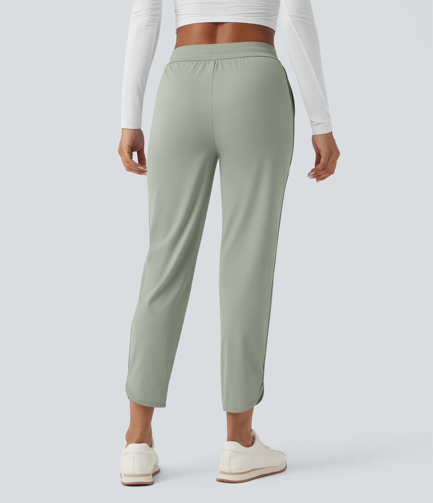 Golf-Hose mit mittelhohem Bund, Seitentaschen und schmal zulaufendem Bein - schnelltrocknend, UPF40+