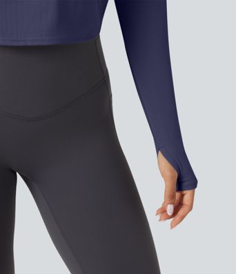 SoftlyZero™ nopeasti kuivuva 2-in-1 jooga- ja treenitoppi, avonaisella takamallilla (twist), pitkät hihat ja peukaloreiät