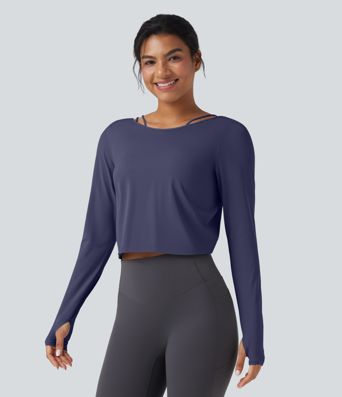 SoftlyZero™ nopeasti kuivuva 2-in-1 jooga- ja treenitoppi, avonaisella takamallilla (twist), pitkät hihat ja peukaloreiät